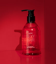 Big Blow Dry Volumizing Gel pump bottle on red background