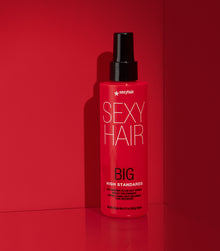 Big High Standards volumizing blowout spray on red background