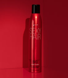 Big Root Pump volumizing spray mousse on red background