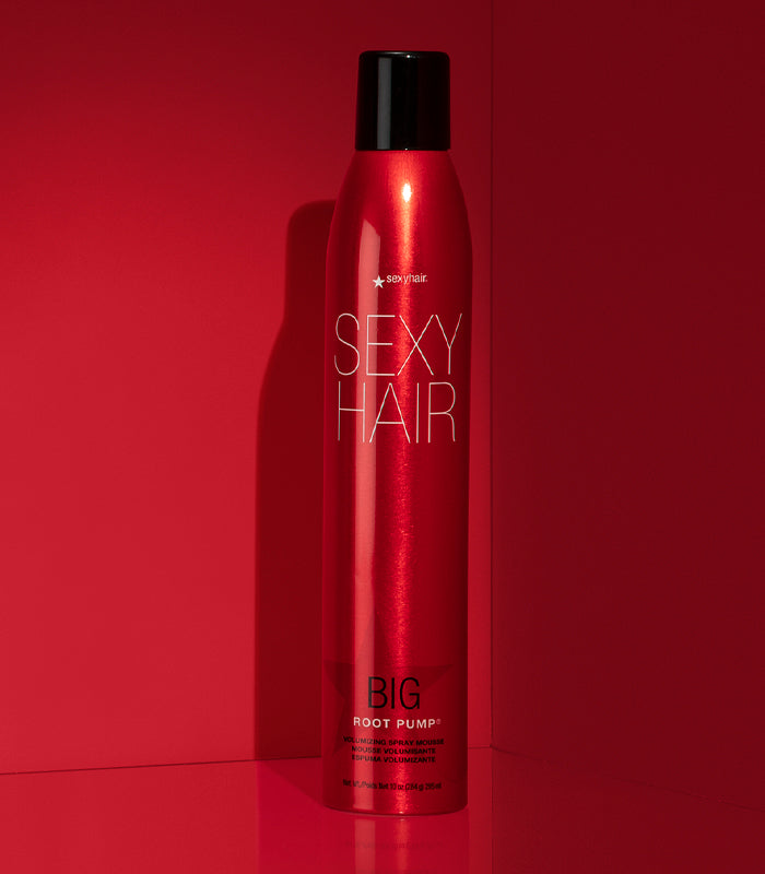 Big Root Pump volumizing spray mousse on red background
