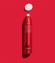 Big Root Pump spray bottle with mousse foam on red background