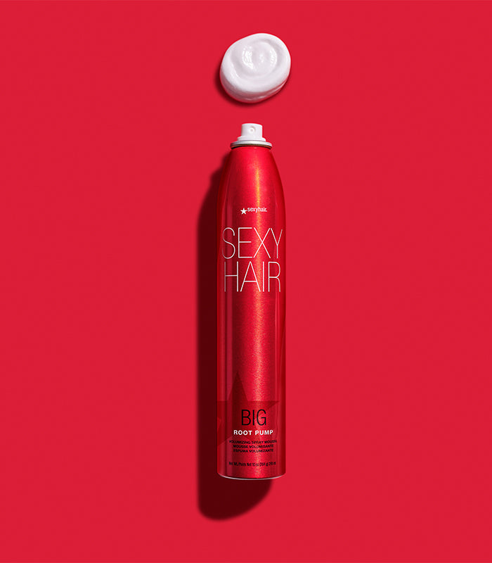 Big Root Pump spray bottle with mousse foam on red background