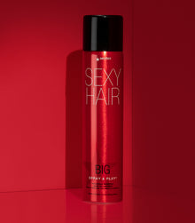 Big Spray & Play volumizing hairspray on red background