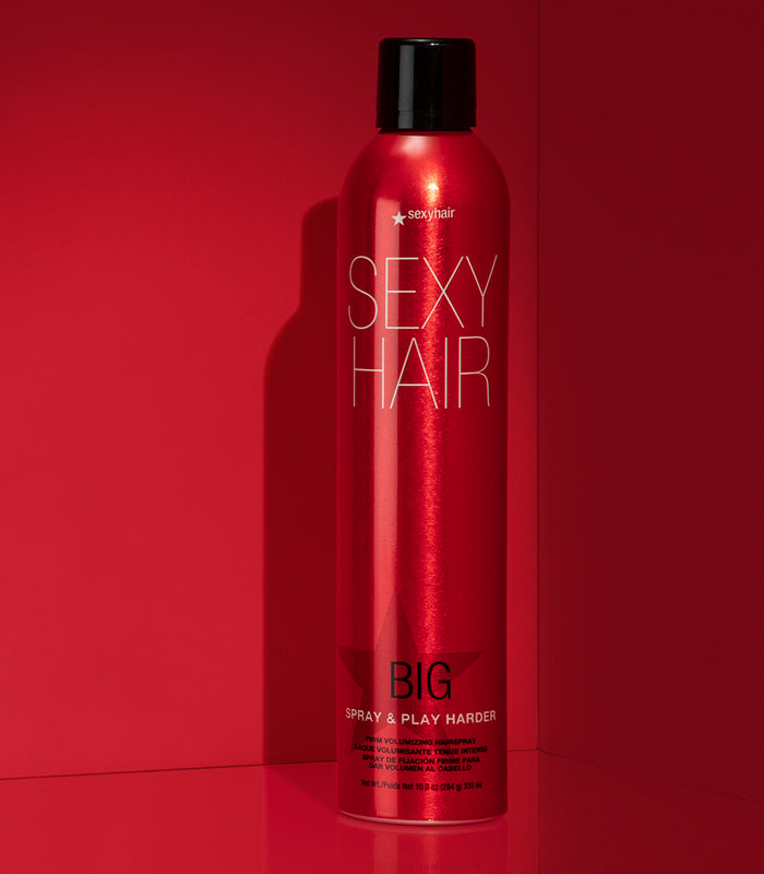 Big Spray & Play Harder firm hairspray on red background