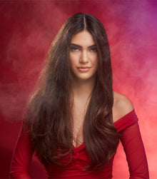 Model with smooth frizz-free hair using Weather Proof