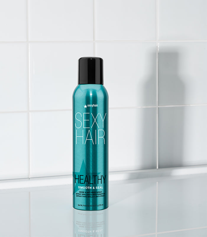 Healthy SexyHair Smooth & Seal spray bottle on white tiled background