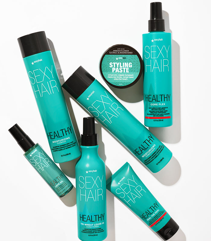 Multiple Healthy SexyHair products including conditioner arranged on white