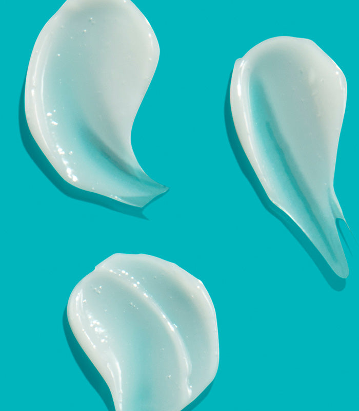 I Want SexyHair Moisture creamy conditioner texture swatches on turquoise background