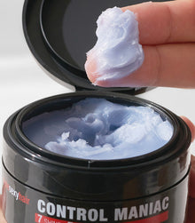 Style SexyHair Control Maniac wax texture sample being held on fingertip surface