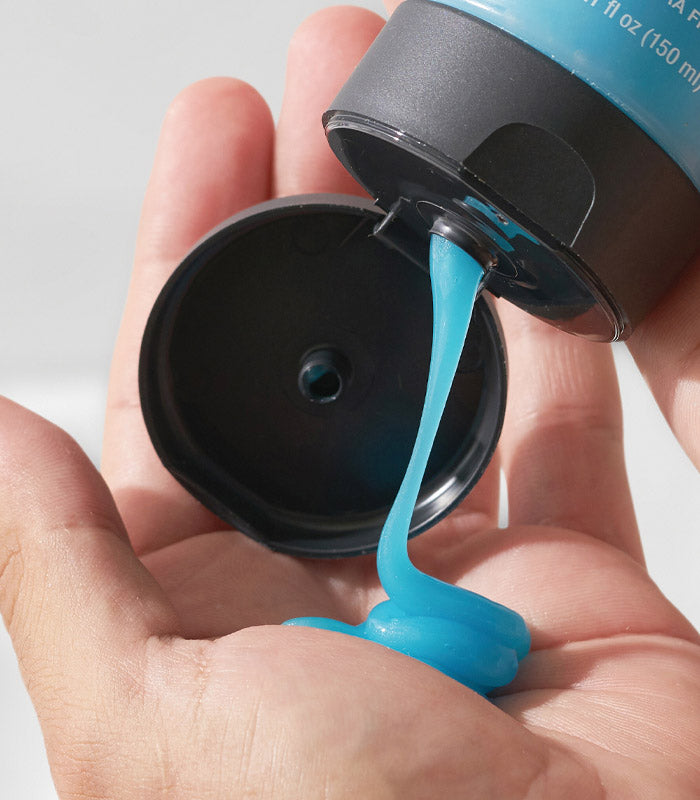 Style SexyHair Hard Up gel texture being dispensed from container showing consistency