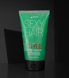 Style SexyHair Not So Hard Up medium holding gel in green tube on dark background