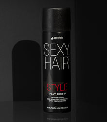 Style SexyHair Play Dirty dry wax spray product bottle displayed on dark background