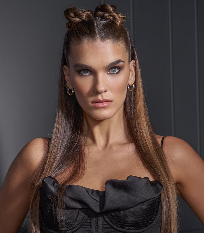 Female model with long protected hair styled using Protect Me hot tool protection spray