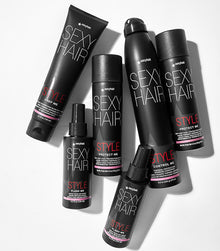Style SexyHair thermal protection hot tool spray products arranged on surface display