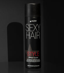 Style SexyHair Spray Clay texturizing hairspray clay bottle displayed on dark background