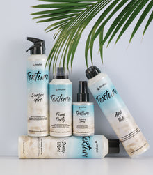Texture SexyHair collection including Beach'n Spray with other products and palm fronds
